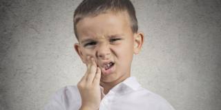 Tumore alla bocca: tra le cause anche le carie dentali