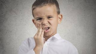 Tumore alla bocca: tra le cause anche le carie dentali