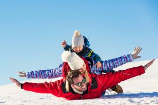 Ski, snow sun and fun - happy family on ski holiday. Ski, snow sun and fun - happy family on ski holiday.