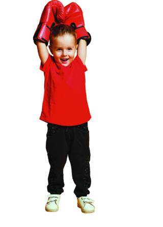 Little Cute Boy 4 years old in a red T-shirt and red boxing gloves on a yellow background, triumphantly raised his hands up, win Little Cute Boy 4 years old in a red T-shirt and red boxing gloves on a yellow background, triumphantly raised his hands up, win