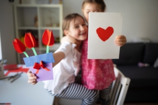 craft for kids. cards with heart and bouquet of paper flowers for mother's day, March 8 or birthday. DIY create art for children